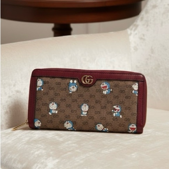 Gucci Handbags - COA Gucci x Doraemon Zip Around Long Wallet